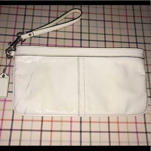 COACH patent leather wristlet